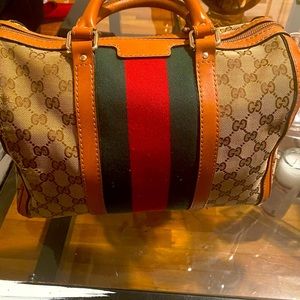 Brown Gucci monogram GG bag